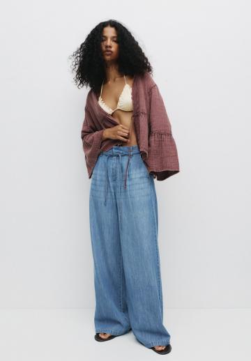 Клешеные джинсы