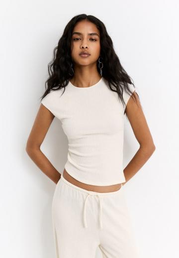 Блузка без рукавов