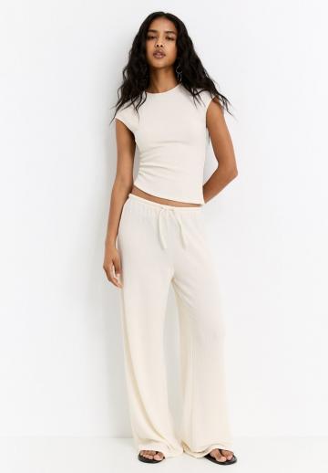 Блузка без рукавов