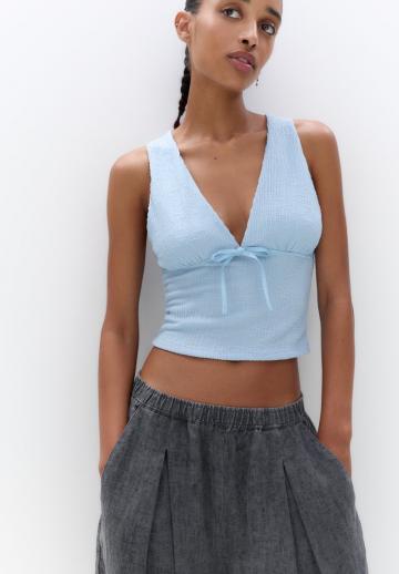 Блузка без рукавов