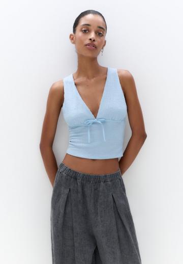 Блузка без рукавов