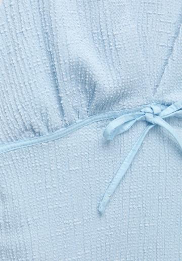 Блузка без рукавов