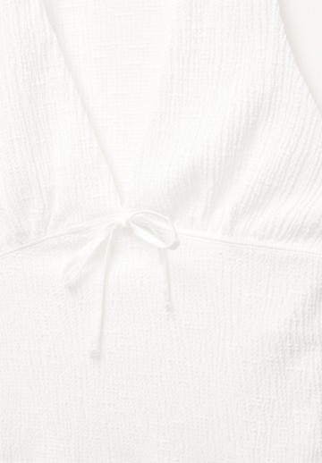 Блузка без рукавов