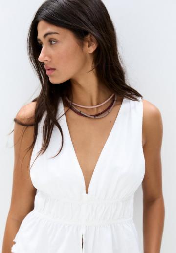 Блузка без рукавов