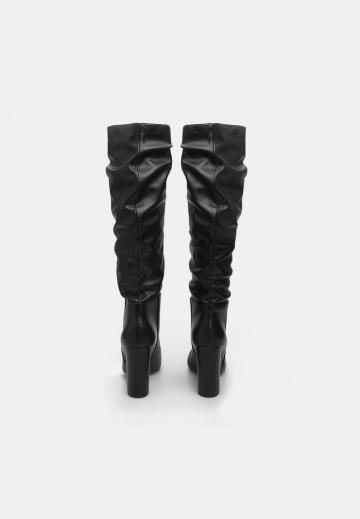 Высокие сапоги