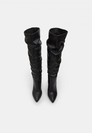 Высокие сапоги