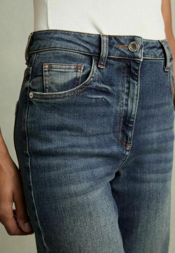 Клешеные джинсы