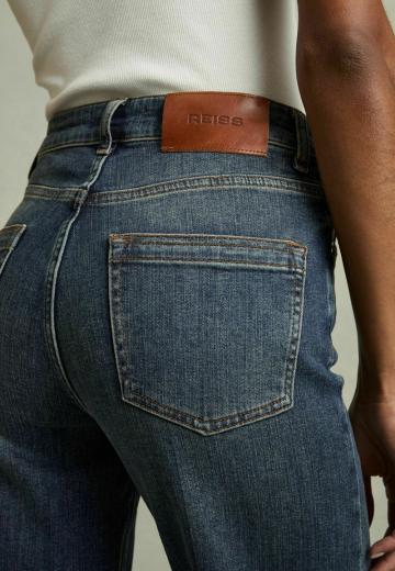 Клешеные джинсы