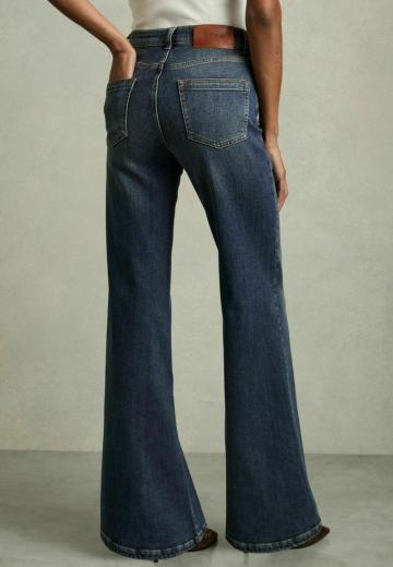 Клешеные джинсы