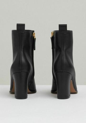 Полусапожки на высоком каблуке