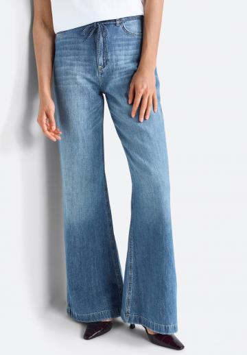 Клешеные джинсы