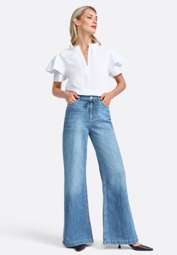 Клешеные джинсы