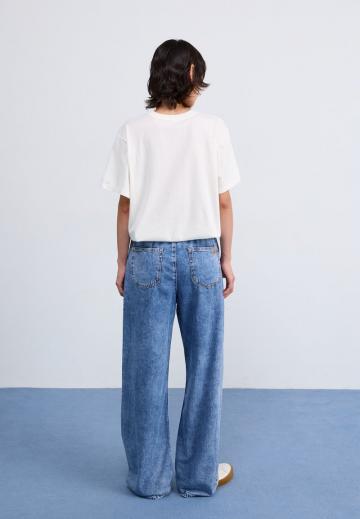 Клешеные джинсы