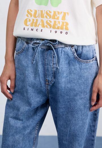 Клешеные джинсы