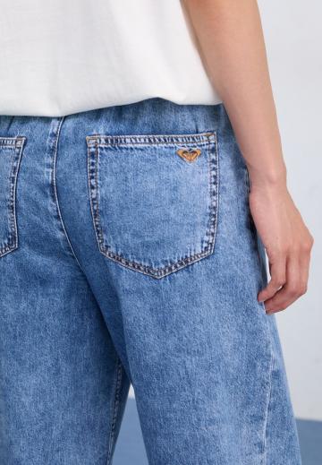 Клешеные джинсы