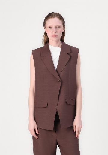 Длинный жилет