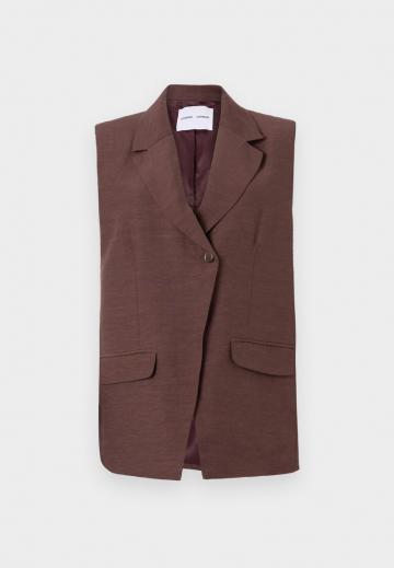 Длинный жилет