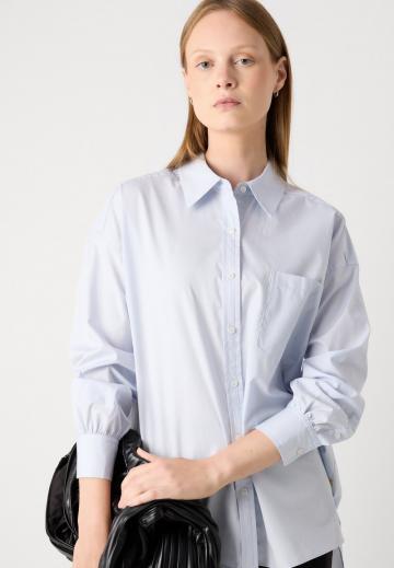 Длинная блузка