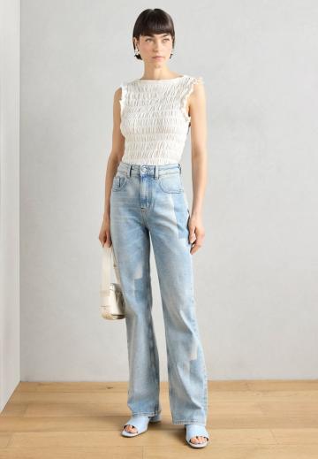 Клешеные брюки