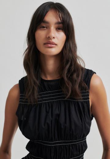 Блузка без рукавов