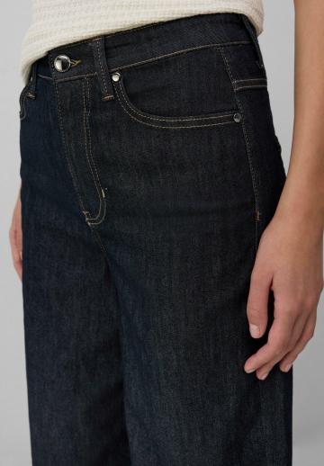 Клешеные джинсы