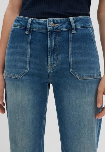 Клешеные джинсы