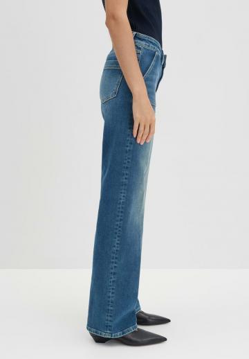 Клешеные джинсы