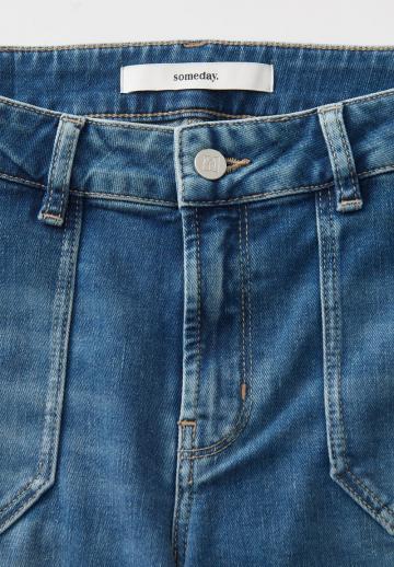 Клешеные джинсы