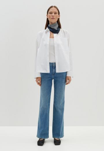 Клешеные джинсы