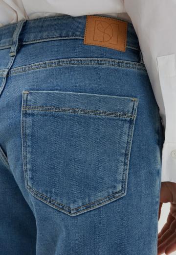 Клешеные джинсы