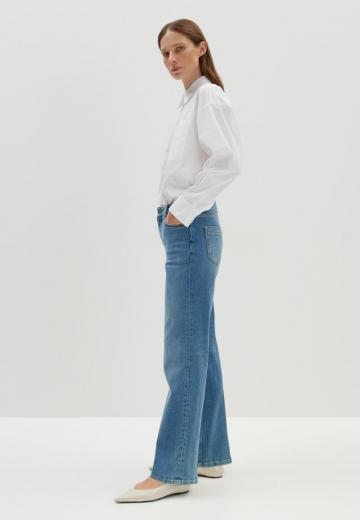 Клешеные джинсы