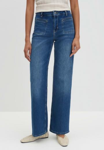 Клешеные джинсы