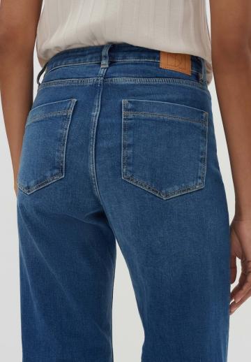 Клешеные джинсы