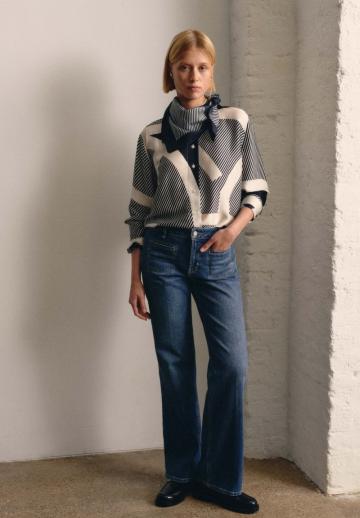 Клешеные джинсы