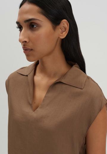 Блузка без рукавов