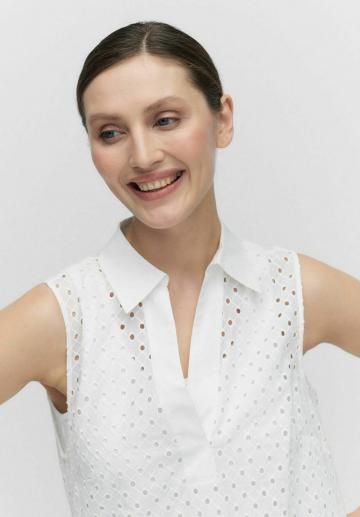 Блузка без рукавов