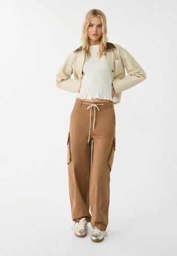 Блузка без рукавов