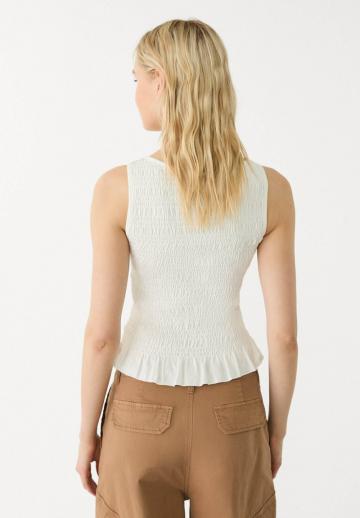 Блузка без рукавов