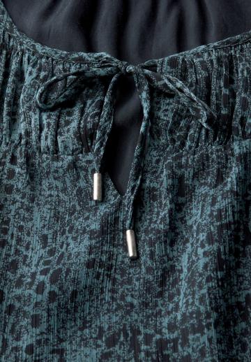 Блузка без рукавов