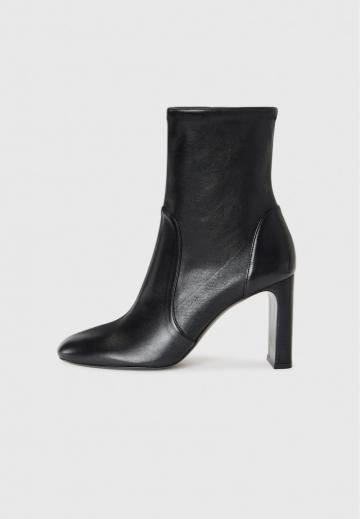 Высокие сапоги