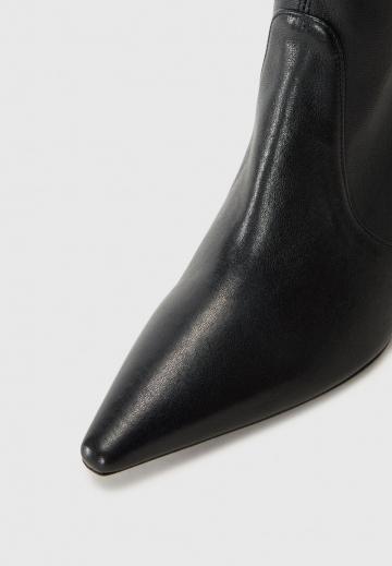 Высокие сапоги