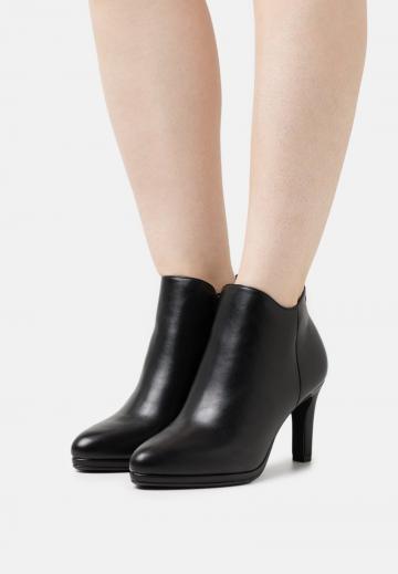 Высокие сапоги