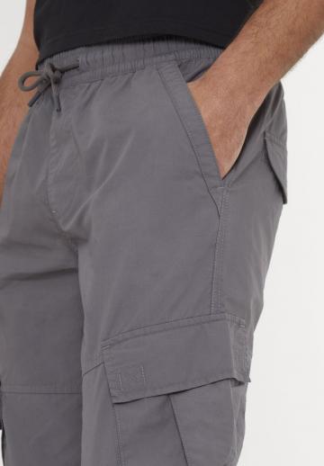 Брюки с накладными карманами