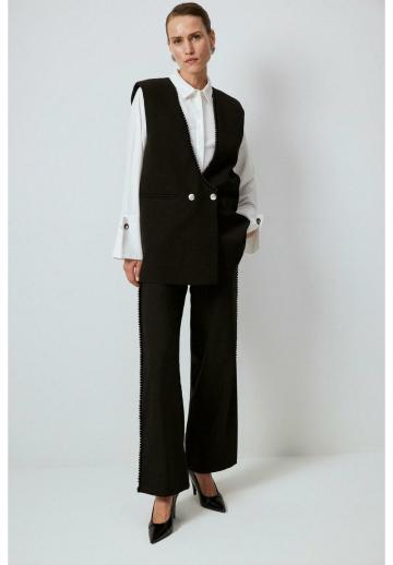 Длинный жилет