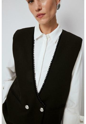 Длинный жилет