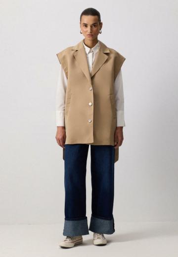 Длинный жилет
