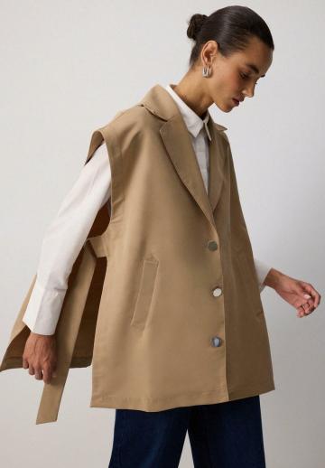 Длинный жилет