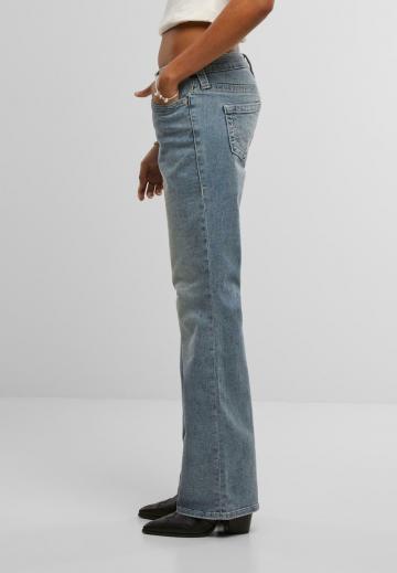 Клешеные джинсы