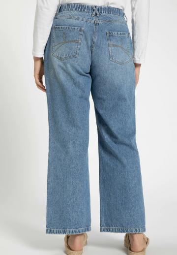 Клешеные джинсы