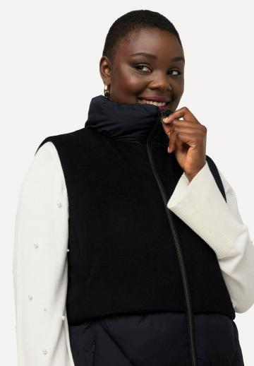 Длинный жилет